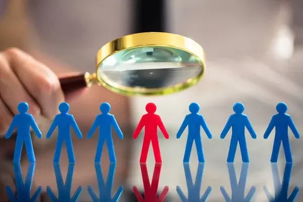 Hiring candidate under a magnifying glass